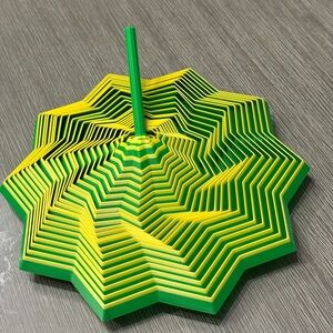 Vibrant Green and Yellow collapsible fidget star